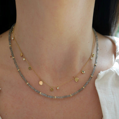 Birthstone Bead Necklace In Labradorite styled on neck with gold confetti necklace